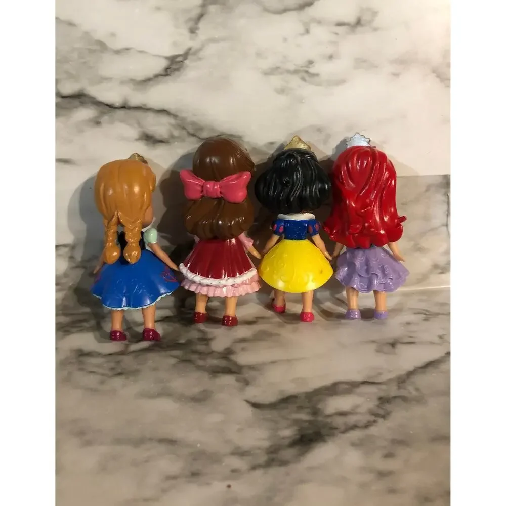 4 Disney Poseable Princess dolls